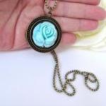 Vintage style blue rose nec..