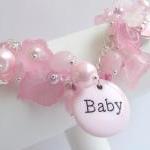 Pink bracelet, New Mommy, i..